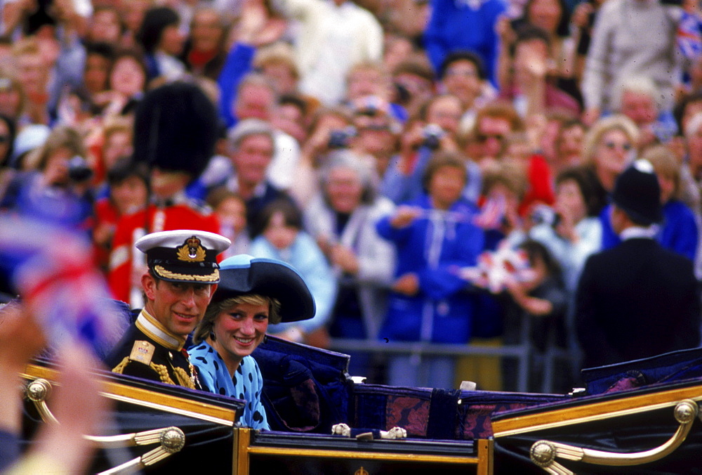 Charles, Prince of Wales Charles and Lady Di on their wedding day ride through London in an open carriage.