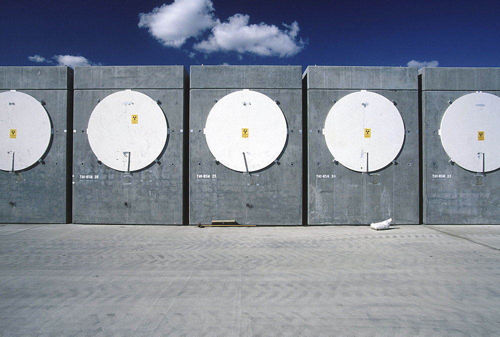 Three Mile Island waste. Transfer of an 80 ton cask holding radioactive debris from the Three Mile Island meltdown reactor. The material was shipped to INEEL 15 years ago for examination and storage until 2035. There are 12 cannisters in each cask. A total of 343 cannisters were shipped to INEEL from Three Mile Island.