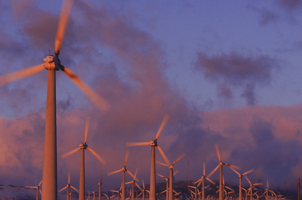 Hightech windmills, some standing 500 feet high when their blades are vertical, hum on the Altamont Pass of California as they produce clean electricity.