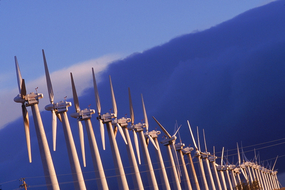 Hightech windmills, some standing 500 feet high when their blades are vertical, hum on the Altamont Pass of California as they produce clean electricity. Wind energy is the world's fastest growing energy source, expanding 25, 35 percent each year. In 2001, roughly 6000 megawatts of new wind capacity was installed around the world, enough to power 2 million American homes.