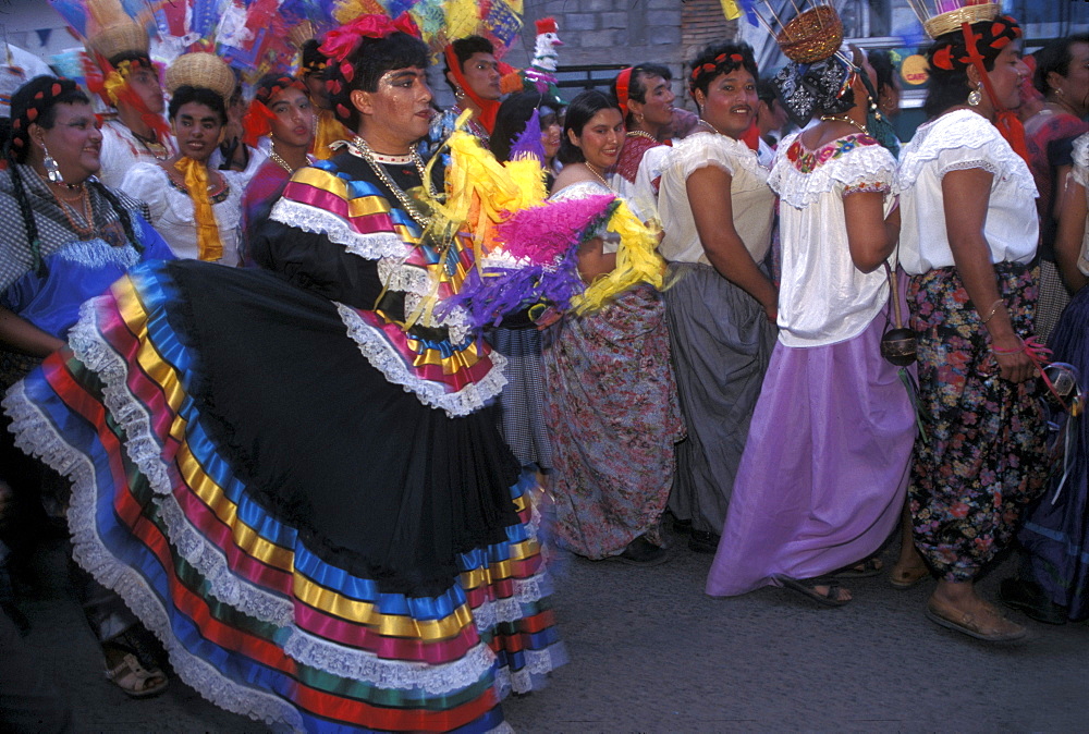 Men in drag parade through the streets o during La Chunta Dance, part of the Fiesta de Enero held each January in Chiapa de Corzo, Chiapas state, Mexico.