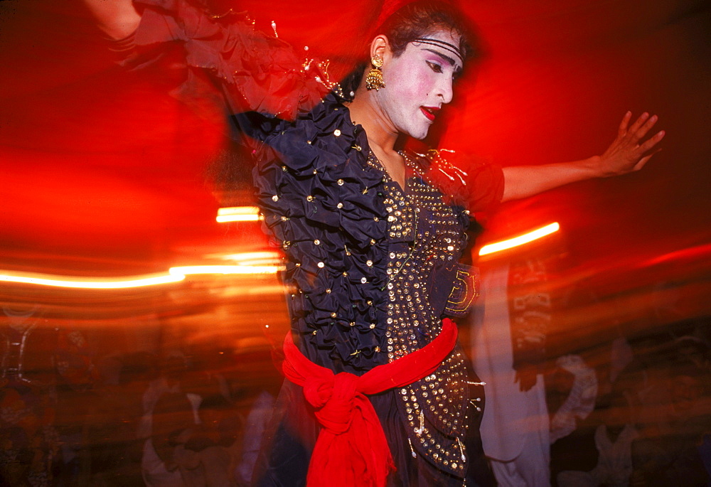 A Hijra dancer entertains the men at a segregated wedding in the Pakistani Punjab