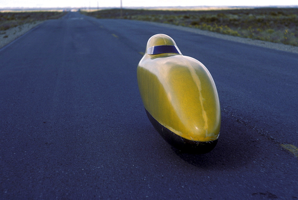 Engineers, athletes and enthusiasts gather on a lonely road in the San Luis Valley in central Colorado to try to break the speed record for a human powered vehicle. These vehicles are basically very, very aerodynamic bicycles.