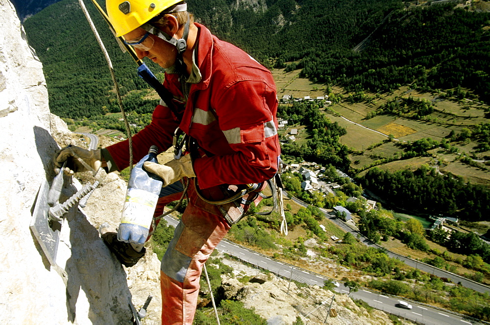 The worker has to be calm and pay close attention to detail while working an estimated 300ft. above the ground.