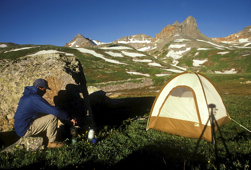 A backpacker in Ice Lake Basin near Silverton in the San Juan Mountains of southwestern Colorado