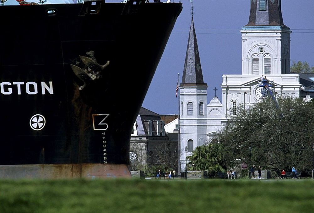 A freighter sailing down the Mississippi River past the French Quarter of New Orleans, Louisiana