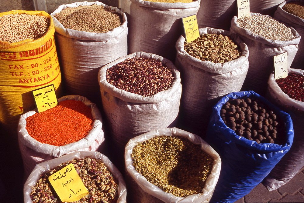 Jordan, The Middle East, Sacks of Spices, Beans and Herbs, inside the Souk in downtown Amman.