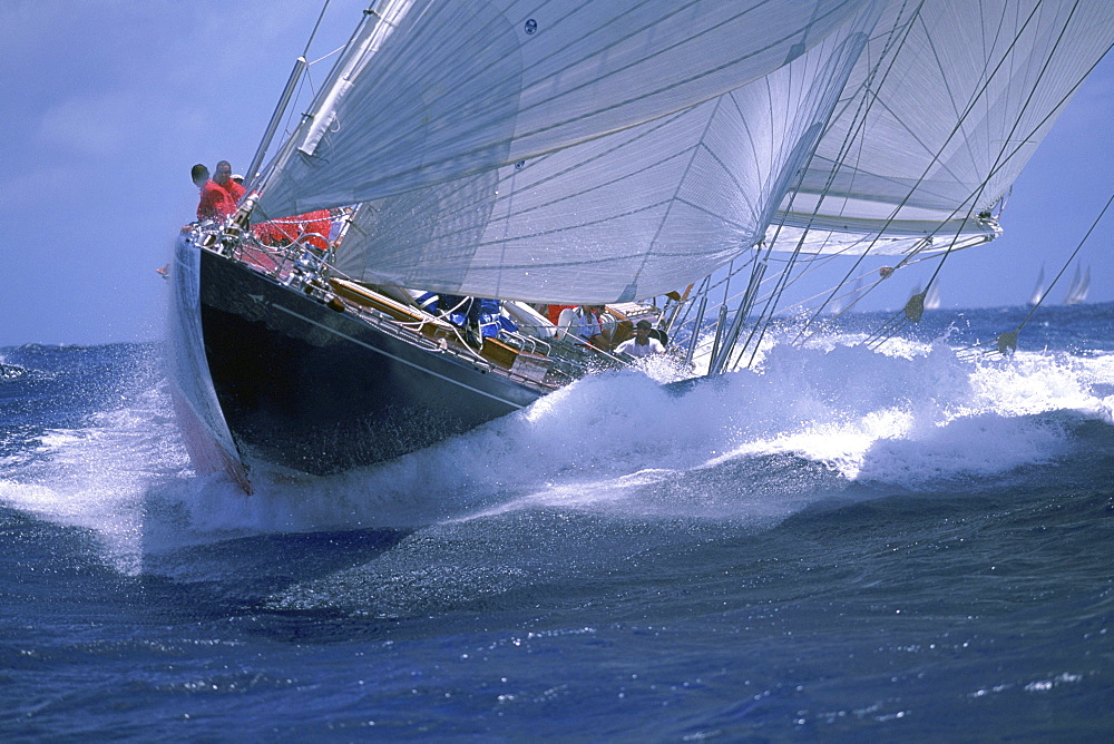 America's Cup J Class yacht "Endeavour" sails under spinnaker in the Antigua Classic Yacht Regatta.