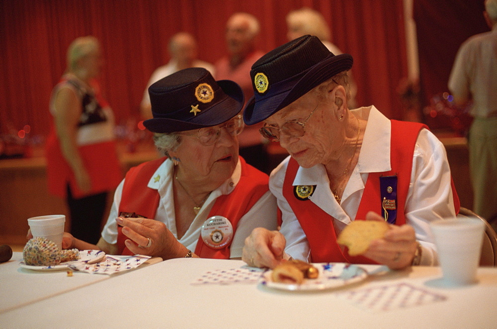 Seniors share a bit of gossip after an American Legion Auxillary meeting in Nalcrest, Forida a planned retirement community for US Postal workers.