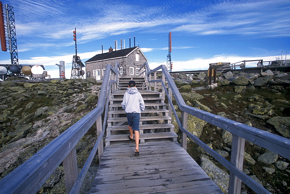 A young visitor on top of Mount Washington, the highest point in New Hampshire.