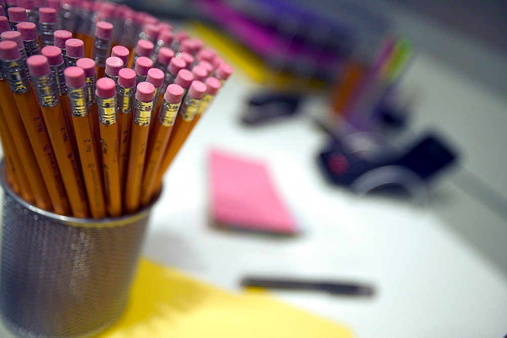 Stack of pencils on an office desk.