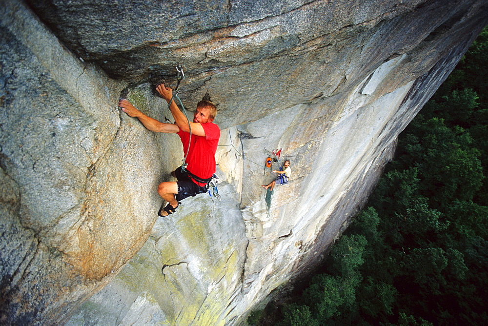 Matt Floyd on the crux roof pitch (5.12+) of The Glass Menagerie on the North Side of Looking Glass Rock near Brevard, NC