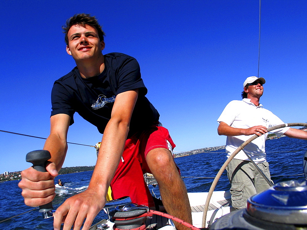 Students learning how sail at the Flying Fish sailing school in the Sydney Harbour.