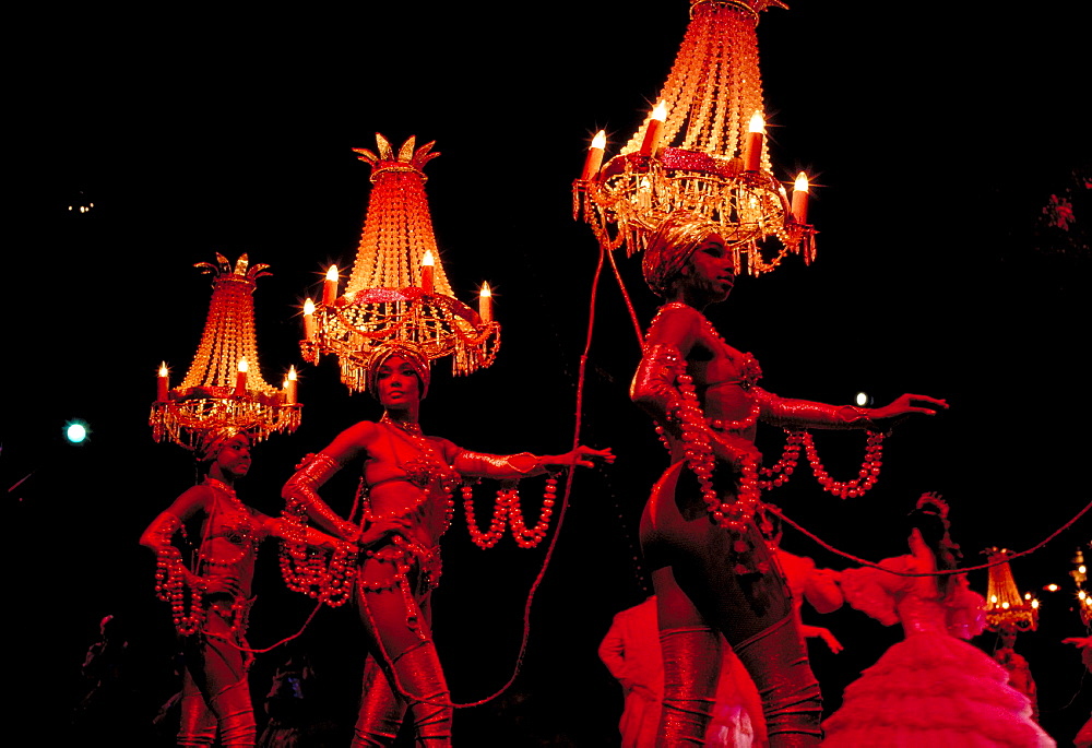 Cuban dancers with chandeliers on their heads dancing at the Tropicana.