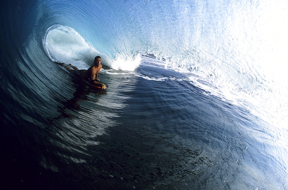 Spencer Skipper in a big, blue tube in Mexico.