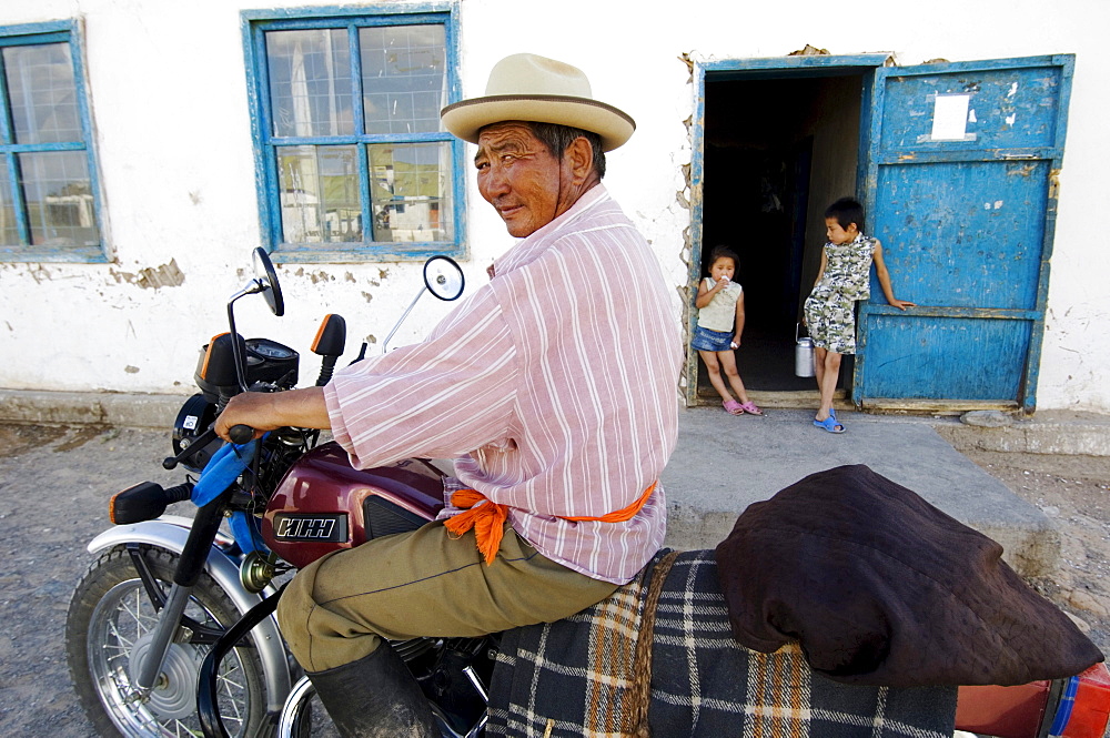 Mongolian nomad on motocycle