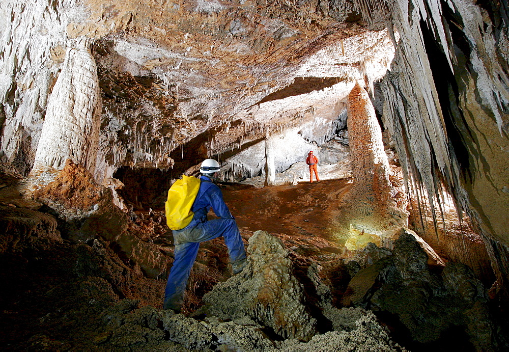 Cave explorers add scale to a cave in Mulu National Park