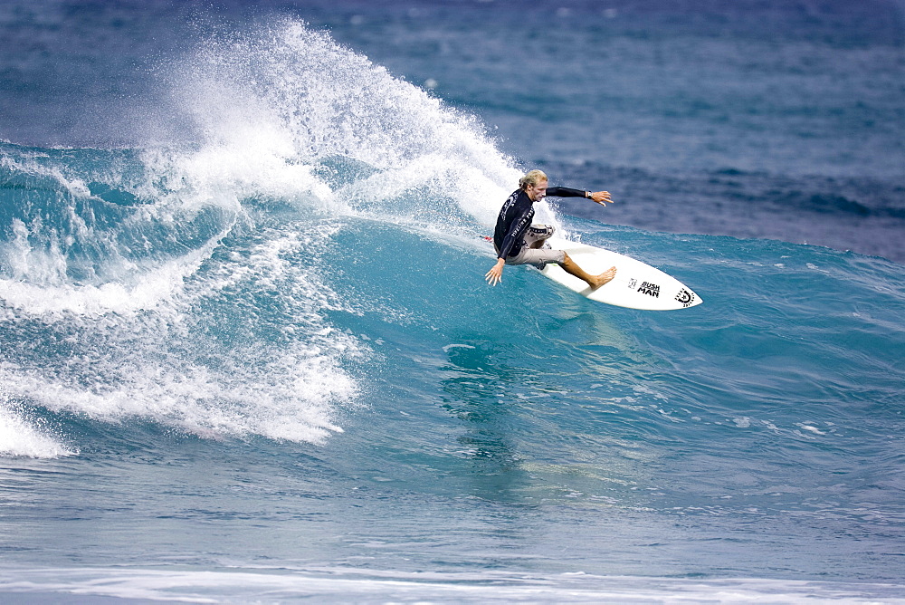 surfer performaing a carving manoeuvre, Hawaii