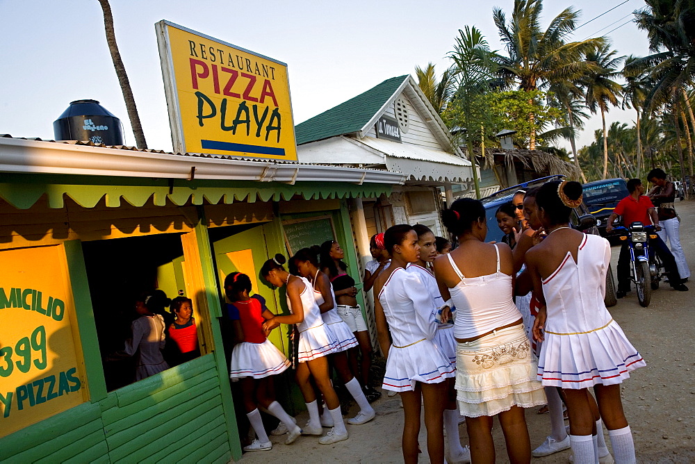 A high school drill team during an outing for pizza in the Dominican Republic