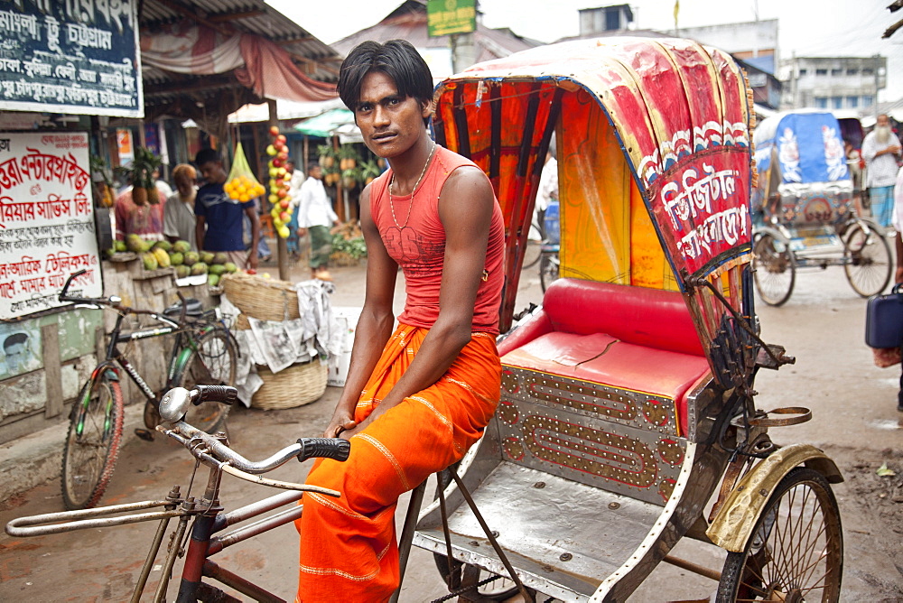 Mongla,  Bangladesh: July 2011: Portrait of a young rickshaw driver in the port city of Mongla western part of Bangladesh.