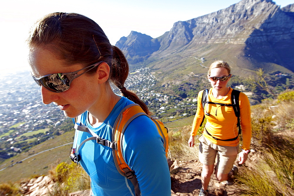 Katrin Schneider and Susann Scheller on a hike to the top of Lion's Head above the city of Cape Town. South Africa.