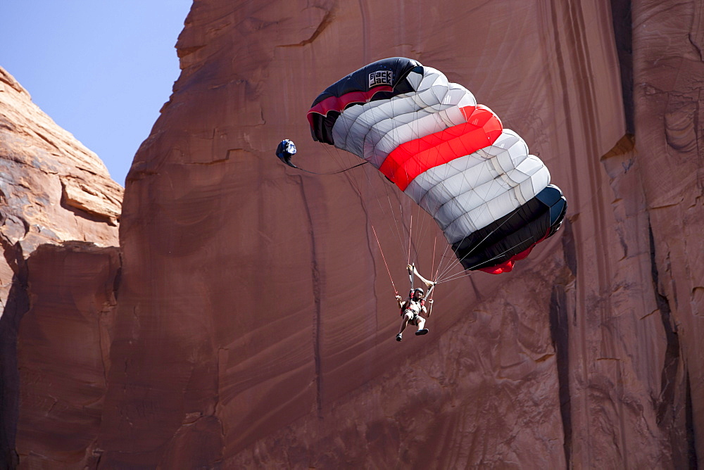 Andy Lewis base jumping off the Tombstone, Moab Utah