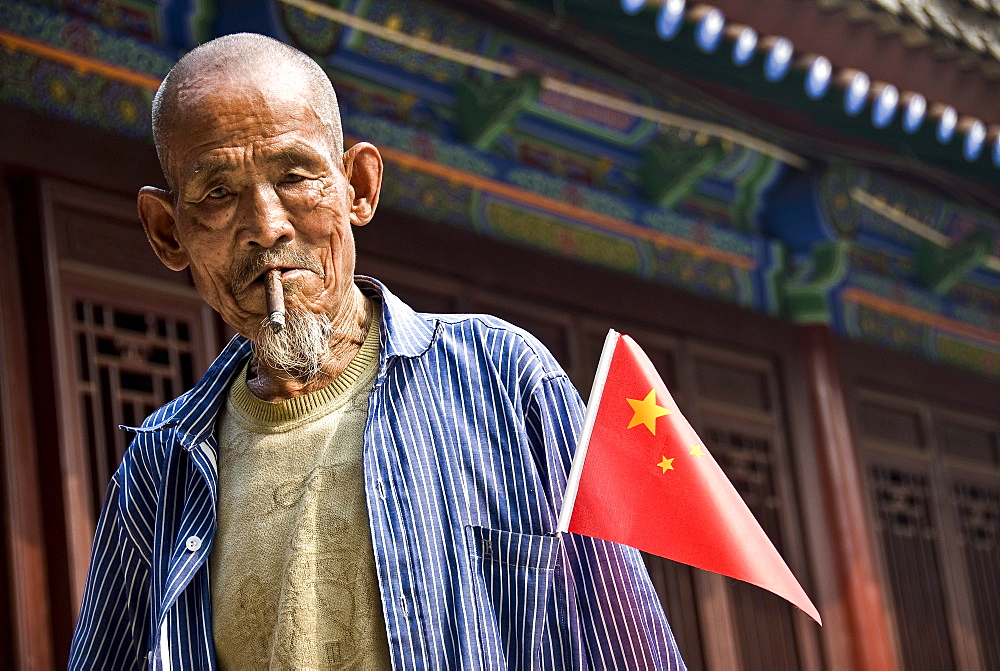 Old local Smoking a cigar, Xian, Shaanxi Province, China