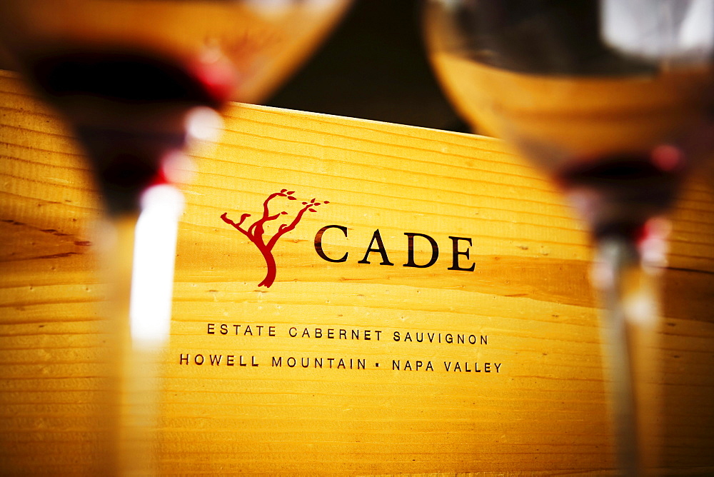 Cade Winery wooden box and empty wine glasses.