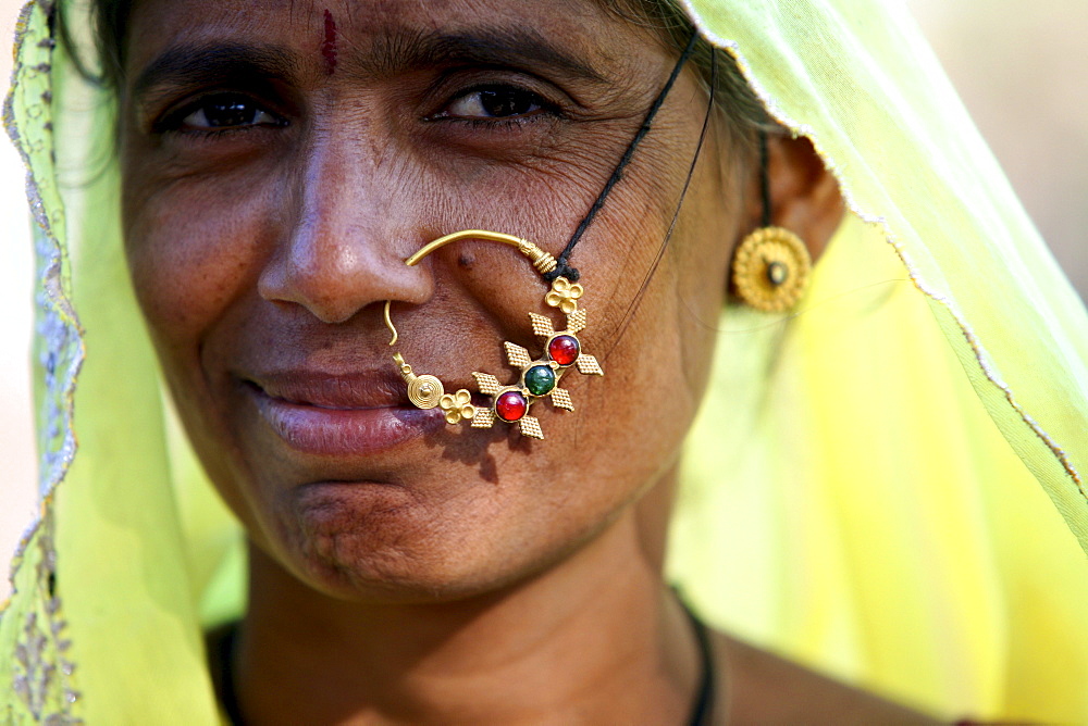 When a woman is married she will wear a large nose ring.  Rajahstan, India, 2008