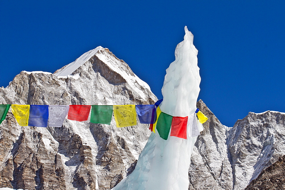 A prayer flag attached to a ice pinnacle at Everest Base Camp