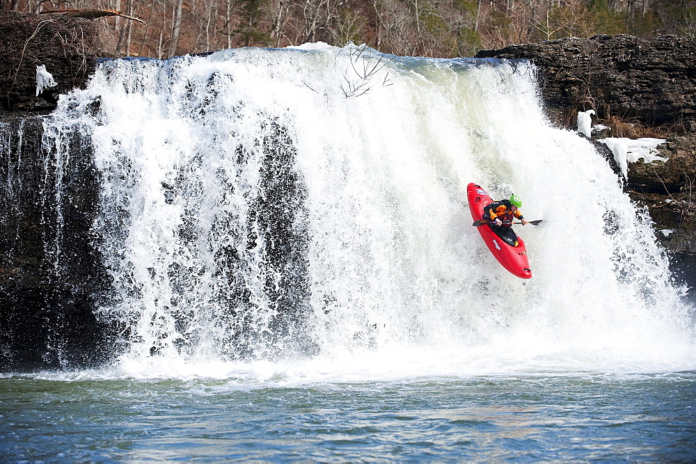 A professional kayaker runs falls in Tennessee.