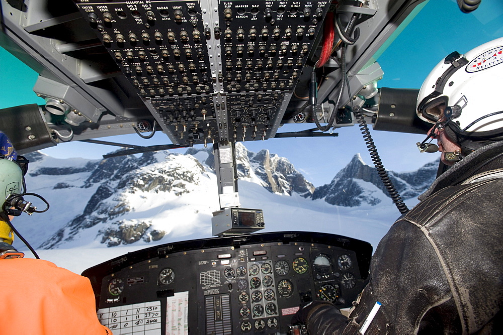 The view through the cockpit while heli-skiing.