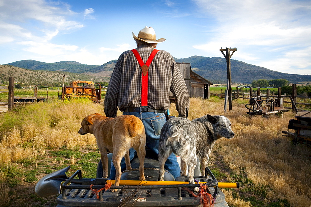 A rancher rides an ATV on his land in Southern Orregon.