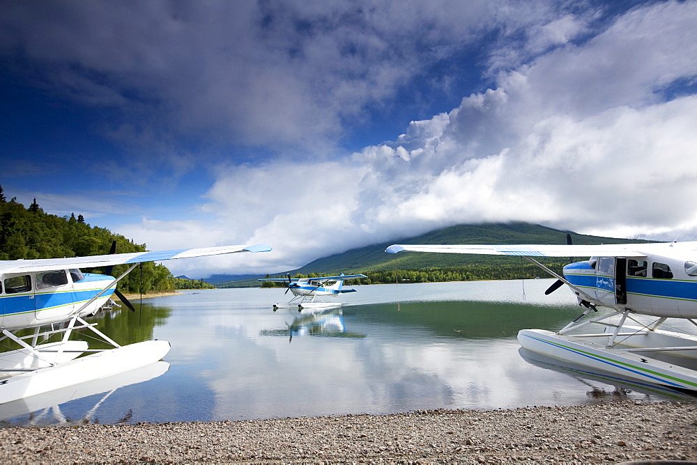 Three float planes in Alaska.