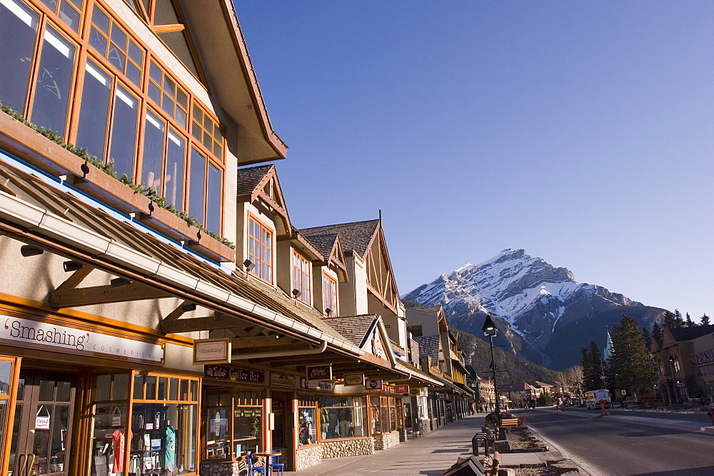 Banff's main street (Banff Avenue) at dawn with Cascade Mountain in the background, Banff National Park, Alberta, Canada.