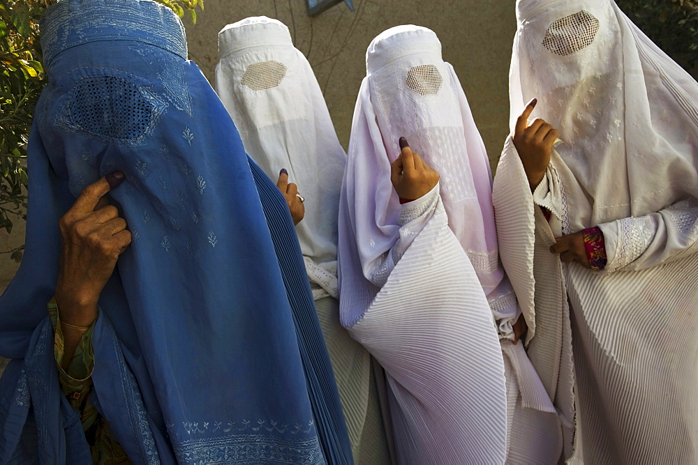 Afghan women vote in the presidential and provincial elections in Mazar-i Sharif, Afghanistan.