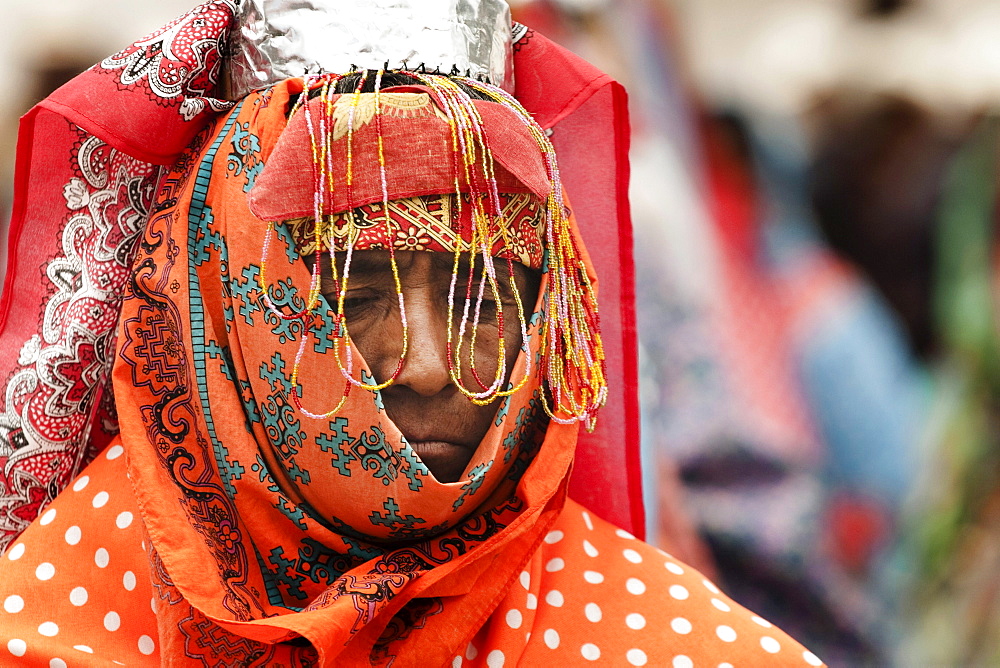 Portrait of a Tarahumara man dressed with traditional clothing for dancing in Guachochi, Chihuahua, Mexico. (black and white)