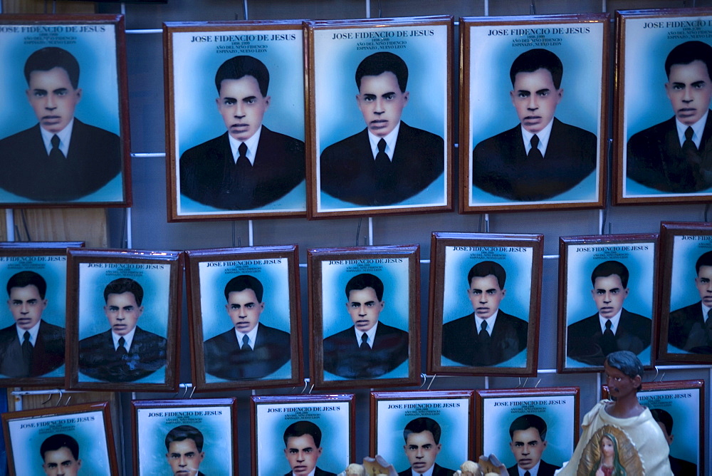 Souvenirs with the image of Nino Fidencio sit for sale during celebrations in his honor in Espinazo, Nuevo Leon state, Mexico