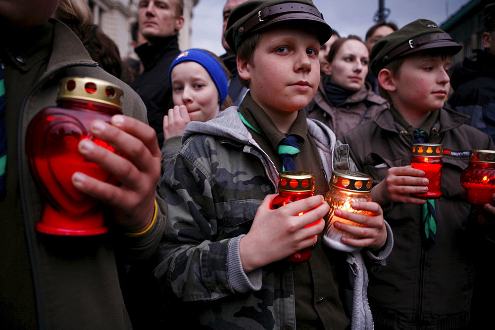 Mourners gather in Warsaw following the death in an airplane crash in Russia of the Polish president Lech Kaczynski, his wife and over ninety other high ranking government, military, civic and religious leaders.