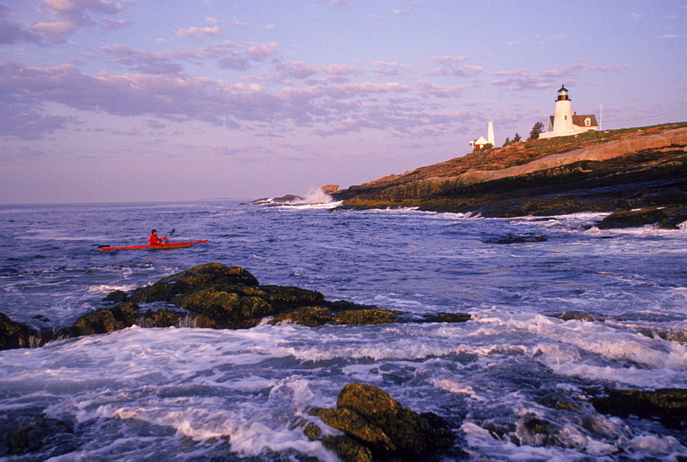 Marc Bourgoin paddles near the Pemaquid Point light house.