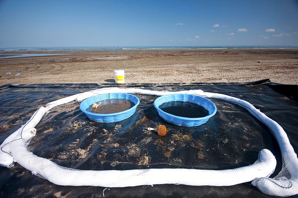 Decontaminate pools along the beach at Grand Terre Island that the clean up crews wash their boots off in at the end of each day. These were left for the night at the end of a shift at 2PM.