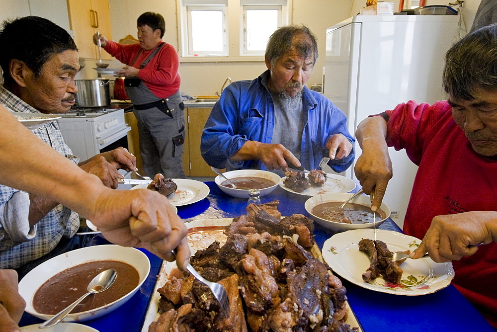 Workers Having Lunch in Eqaluit Ilua, Greenland.
