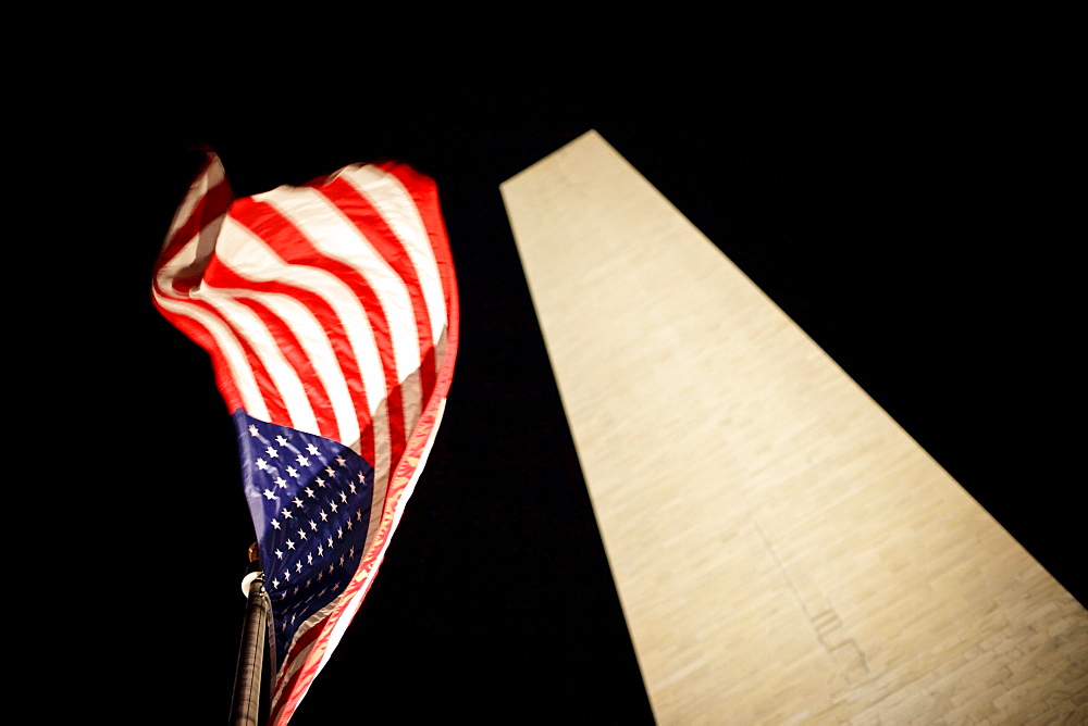 Washington Monument and American flag.