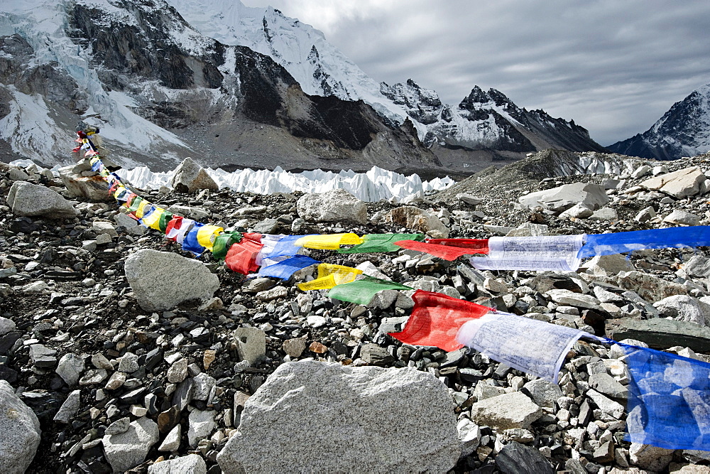 Prayer flags wave in the wind at Mt. Everest base Camp.