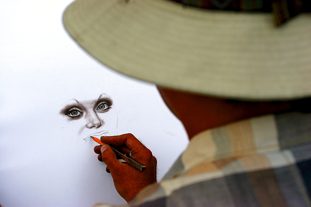 St Petersburg- portraitist drawing a face.