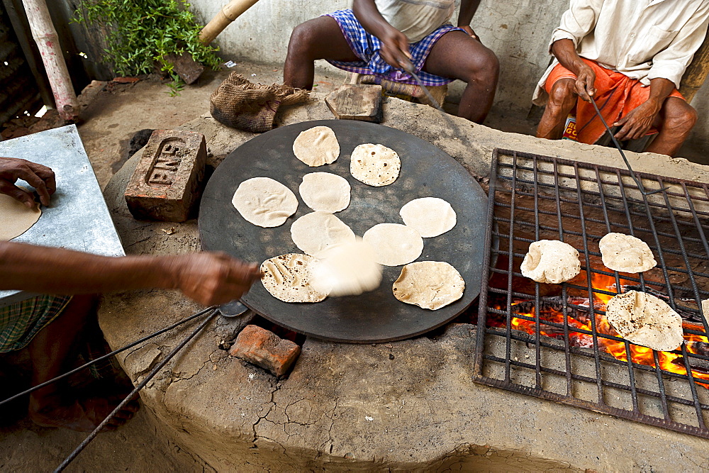 Preparing of food for devotees taking part in Navadvipa Mandala Parikrama festival in Mayapur, India.