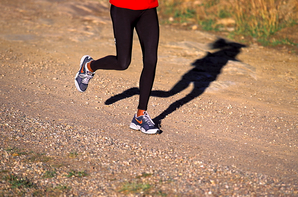 Yvonne Joyce trail running in Vail, Colorado.