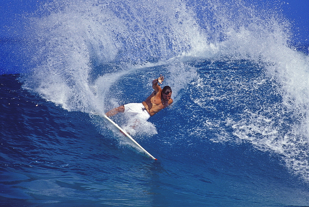 Pancho Sullivan  doing a forehand cutback at Log Cabins, Oahu, north shore