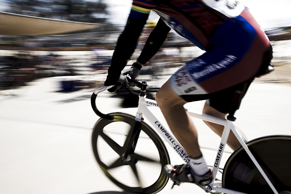 Track cyclists on a veladrome.