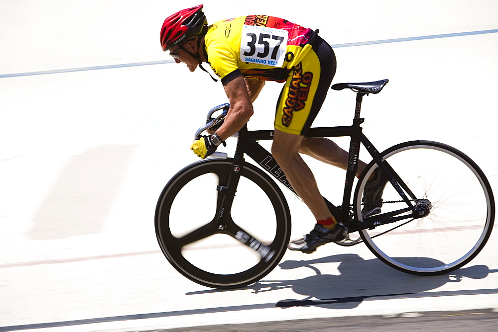 Track cyclists on a veladrome.